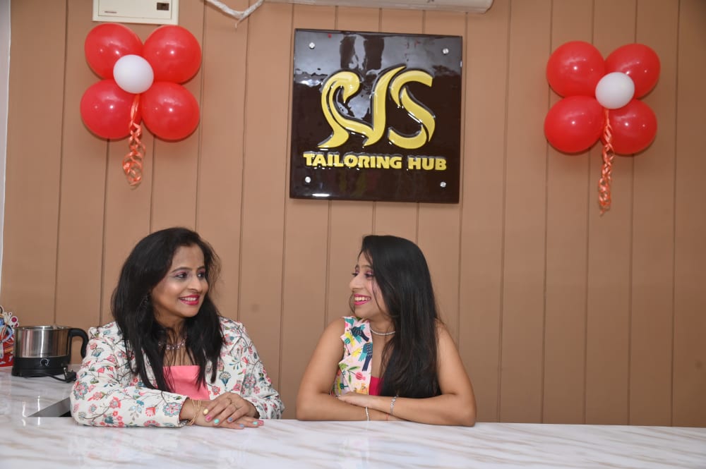Mother-Daughter Duo at Counter